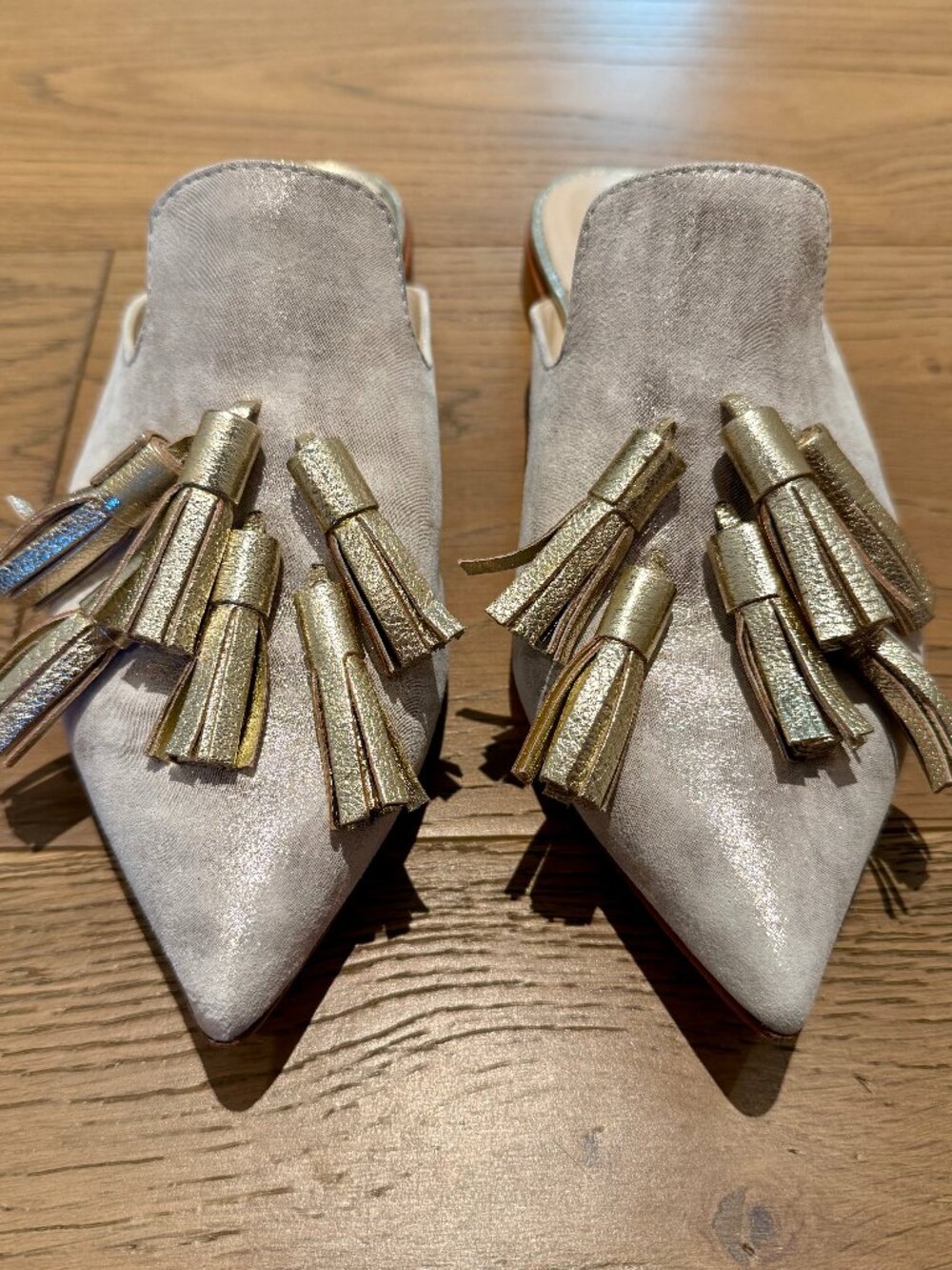 Bells and Becks silver/gold mules with tassels